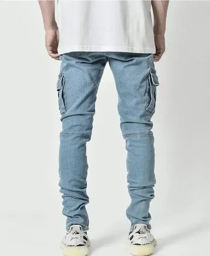 https://ik.imagekit.io/c2dr4dawp/https%3A%2F%2Fhttp2.mlstatic.com%2FD_NQ_NP_685739-CBT69474045557_052023-O-jeans-flexibles-de-bolsillo-multiple-de-moda-masculina.webp?tr=f-jpg